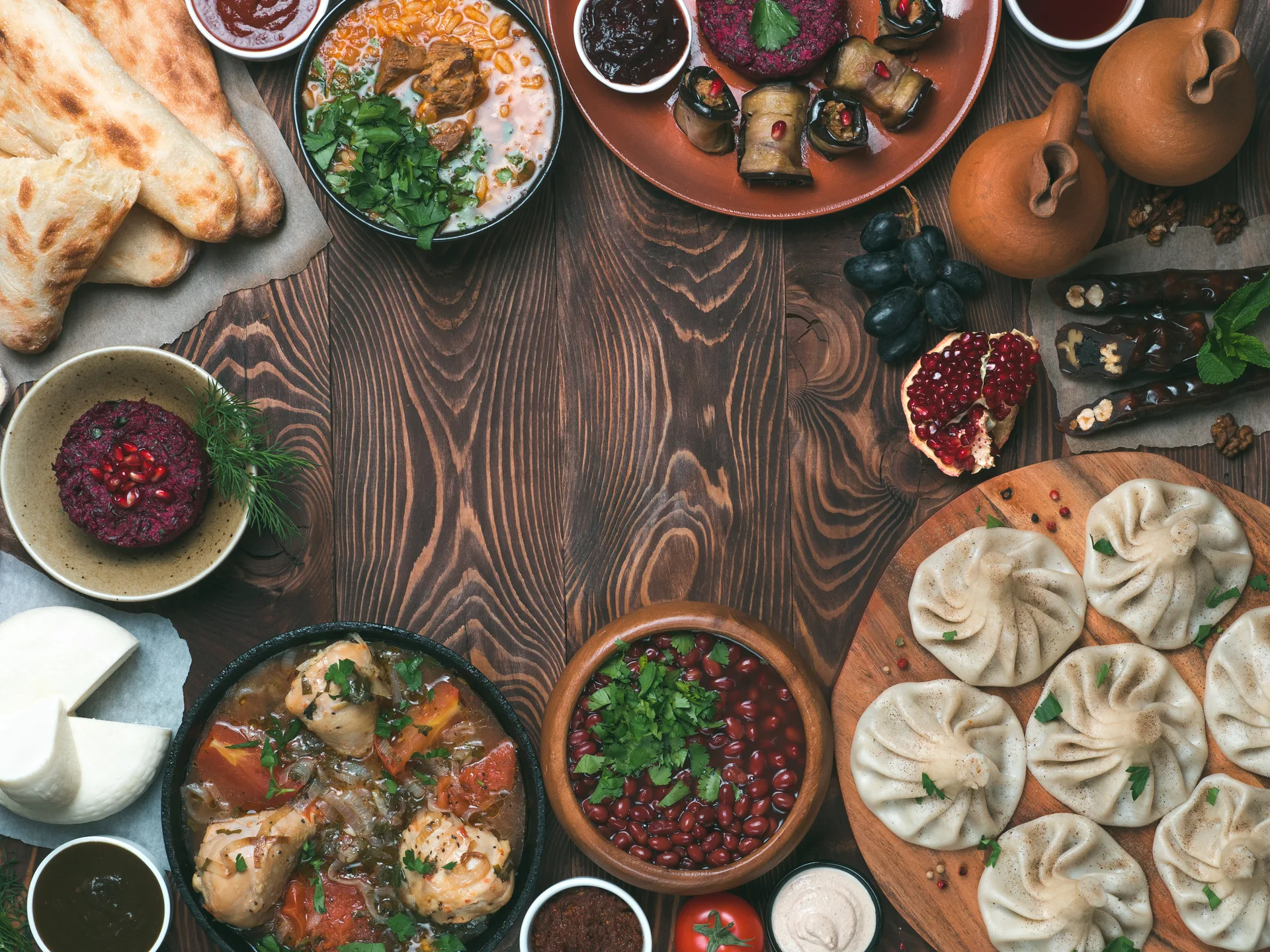 Traditional Georgian food spread on a wooden table